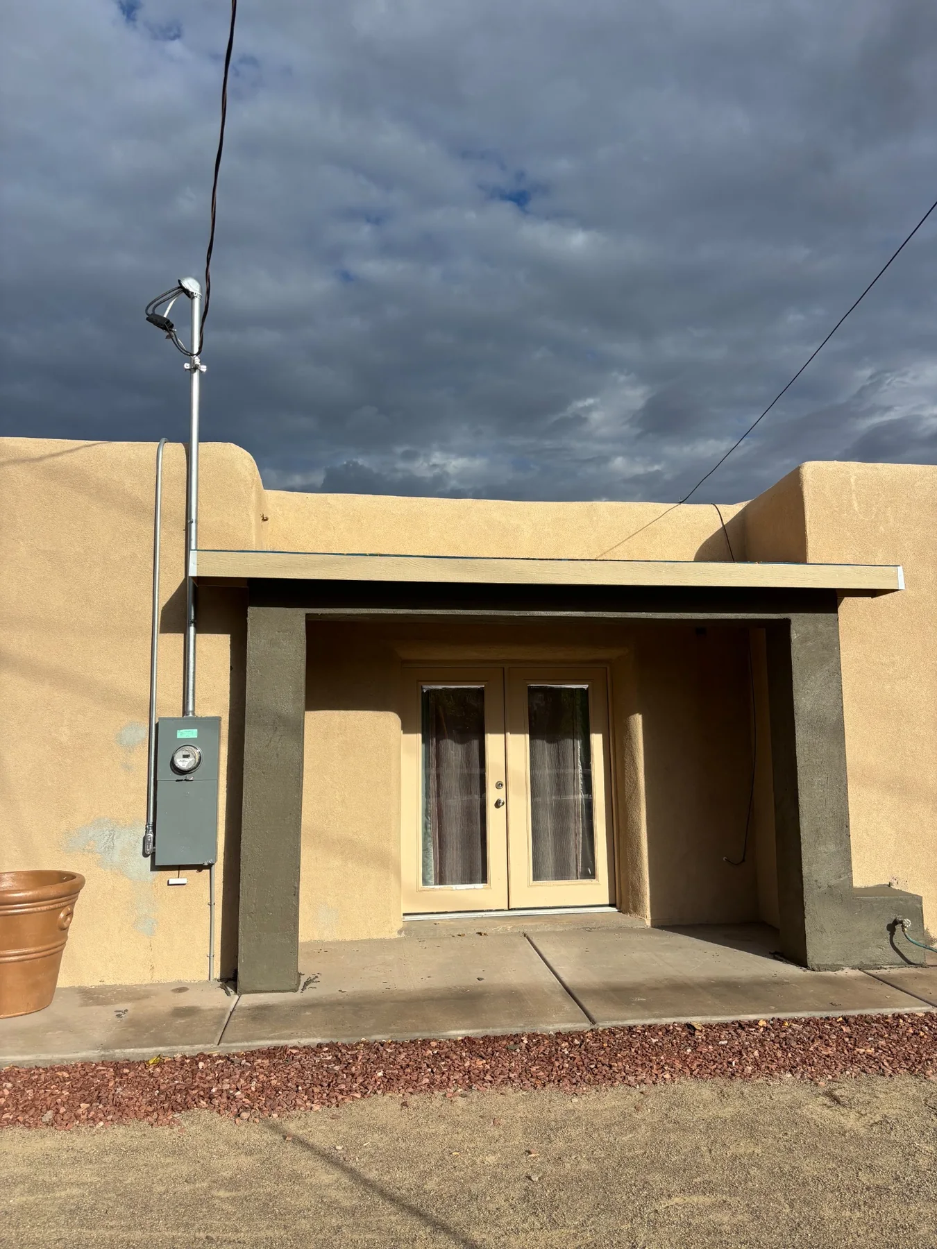 Stucco entryway project during repair and preparation