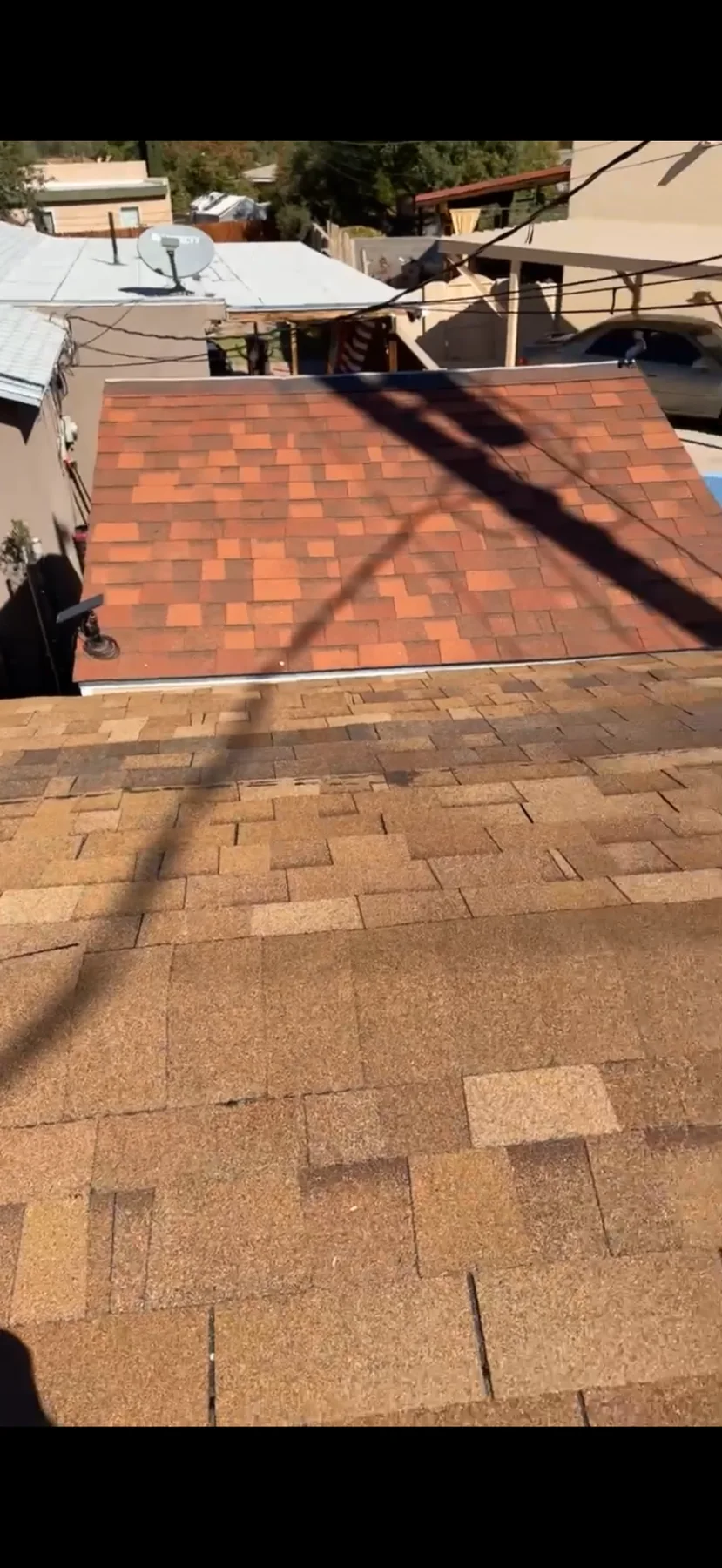 Completed shingle roof with finished roof surface